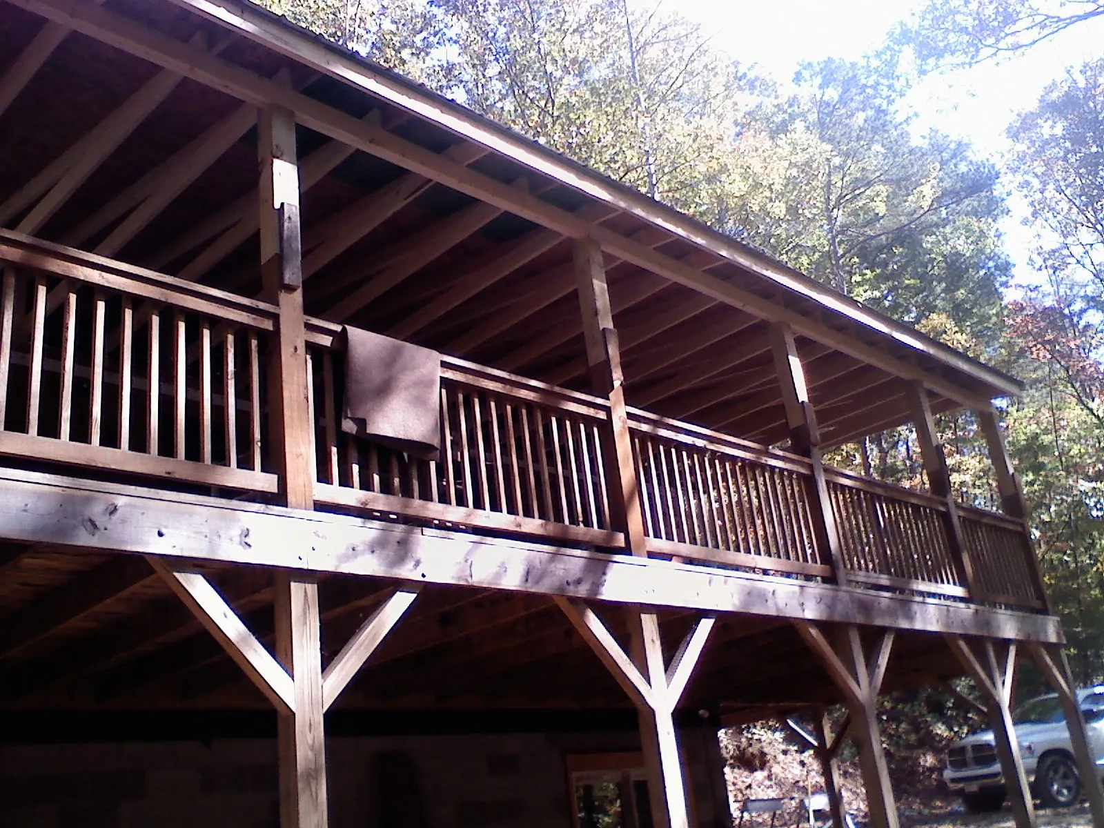 Timber framing under a new elevated porch and deck — Roof Leak Repair in Spring Lake by Roofing Brothers